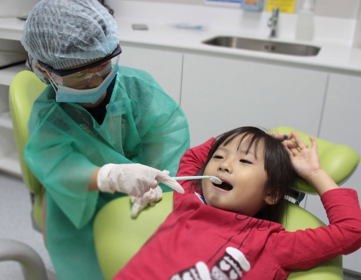 kids dentist singapore dentist near me - tp dental surgeons